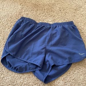 Purple Nike shorts